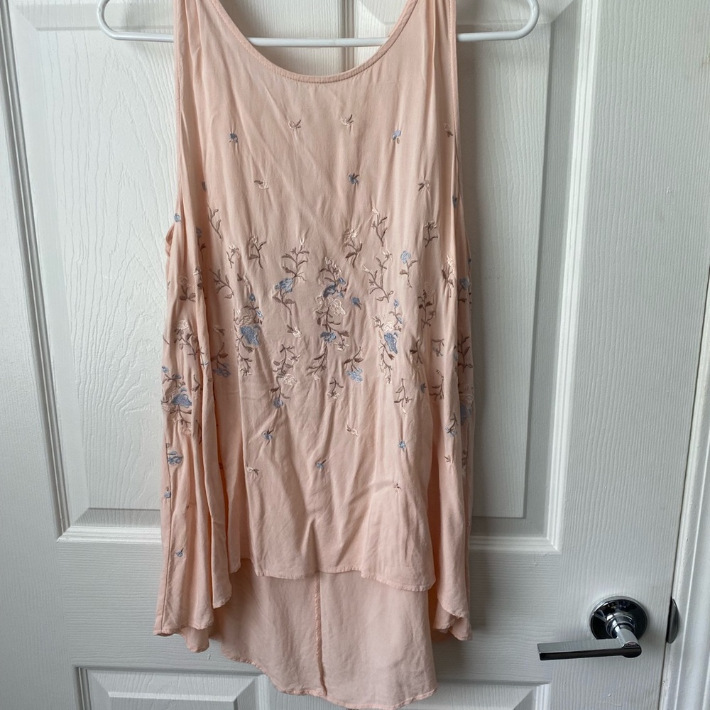 Peach blouse with embroidered flowers